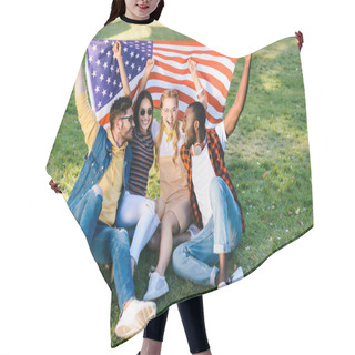 Personality  Multiracial Cheerful Friends With American Flag Sitting On Green Grass In Park Hair Cutting Cape