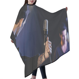 Personality  Tattooed Singer Near Microphone And Blurred Musician On Stage Hair Cutting Cape