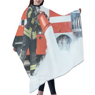 Personality  Cropped Shot Of Firefighter Extinguishing Fire With Foam On Street Hair Cutting Cape