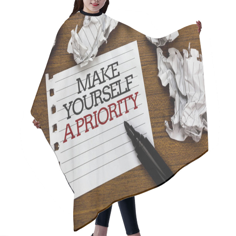 Personality  Text Sign Showing Make Yourself A Priority. Conceptual Photo Think In Your Own Good First Personal Development Paper Lumps Laid Randomly Around White Notepad Touch Black Pen On Woody Floor. Hair Cutting Cape