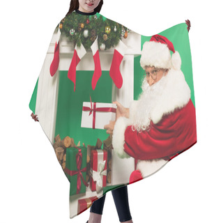 Personality  Santa Claus Holding Present Near Fireplace With Fir Branches And Baubles On Green Background Hair Cutting Cape