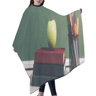Personality  Horizontal Image Of Ripe Apple On Books Near Pen Holder With Color Pencils Near Green Chalkboard Hair Cutting Cape
