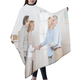 Personality  Couple Of Middle Aged Man And Woman Greeting Their Friends As Guests And Shaking Hands Hair Cutting Cape