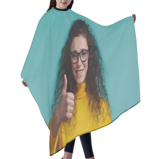 Personality  Happy Woman In Glasses And Turtleneck Showing Thumb Up Isolated On Blue Hair Cutting Cape