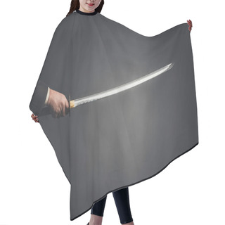 Personality  Cropped Shot Of Man Holding Katana On Black Hair Cutting Cape