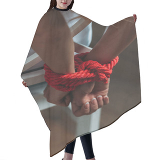 Personality  Cropped View Of Female Hands Tied With Red Rope On Wooden Background Hair Cutting Cape
