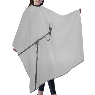 Personality  Black Microphone With Wire On Metal Stand Isolated On Grey With Copy Space, Studio Shot  Hair Cutting Cape