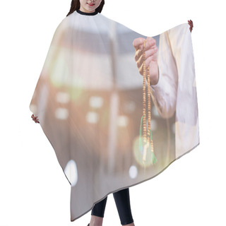 Personality  Hand Holding A Muslim Rosary Hair Cutting Cape