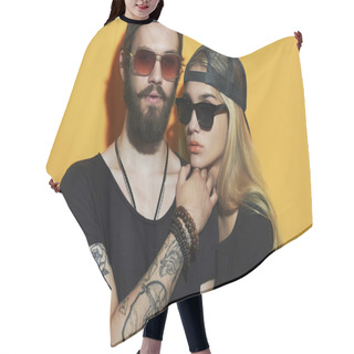 Personality  Fashion Beautiful Couple Together. Tattoo Hipster Boy And Girl. Bearded Young Man And Blonde In Sunglasses Hair Cutting Cape