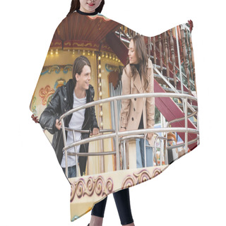 Personality  Cheerful Couple In Autumnal Outfits Looking At Other On Carousel In Amusement Park Hair Cutting Cape