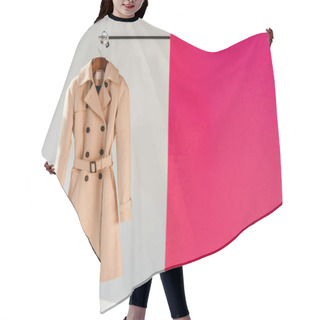Personality  Elegant Beige Trench Coat On Hanger At Pink And Grey Background  Hair Cutting Cape