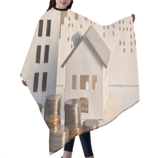 Personality  Houses Models On White Wooden Table With Coins, Real Estate Concept Hair Cutting Cape
