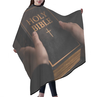 Personality  Cropped View Of Woman Holding Holy Bible In Dark Hair Cutting Cape