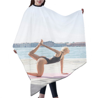 Personality  Side View Of Sportive Woman Practicing Tiger Yoga Pose On Mat On Embankment In Italy  Hair Cutting Cape
