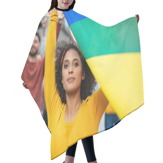 Personality  Mixed Race Young Woman At Women Empowerment Strike Holding Rainbow Flag. Proud Multiethnic Lesbian Girl In Rally To Protest On Equality For Gay. Portrait Of Confident Girl With Group Of Activists Outdoor During Gay Pride Parade.  Hair Cutting Cape