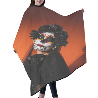 Personality  Woman In Santa Muerte Halloween Costume Looking At Camera On Red Background  Hair Cutting Cape