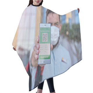Personality  Man Holding Smartphone Displaying On App Mobile Valid Digital Green Vaccination Certificate For Covid-19. Immunity Vaccine E-passport, Vaccination Certificate, Health Passport For New Normal Travel Hair Cutting Cape
