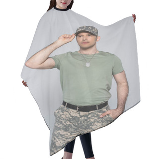 Personality  Patriotic Soldier In T-shirt Adjusting Military Cap During Memorial Day Isolated On Grey  Hair Cutting Cape