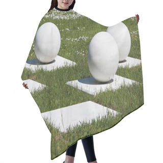 Personality  Abstract Outdoor Composition Of White Balls On Bases Hair Cutting Cape