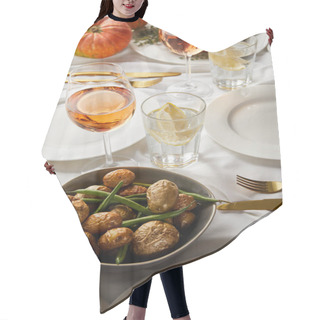 Personality  Festive Dinner With Baked Seasonal Vegetables Near Glasses With Rose Wine And Lemon Water Served On White Tablecloth  Hair Cutting Cape