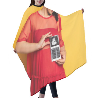 Personality  Partial View Of Pregnant Woman In Red Outfit Holding Ultrasound Scan Near Tummy On Yellow Hair Cutting Cape