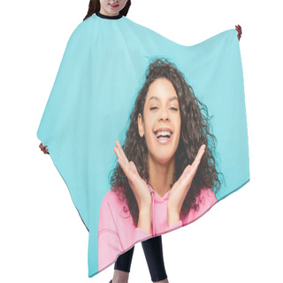 Personality  Excited Curly African American Girl Smiling While Standing Isolated On Blue  Hair Cutting Cape