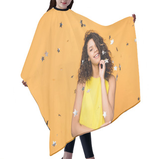 Personality  Happy Curly African American Girl In Yellow Dress Standing Near Shiny Confetti Stars On Orange  Hair Cutting Cape
