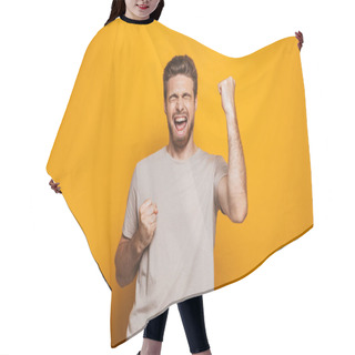 Personality  Image Of Handsome Happy Man Standing Isolated Over Yellow Wall Backgroung Make A Winner Gesture. Hair Cutting Cape
