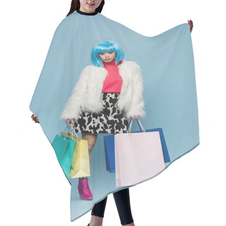 Personality  Pretty Asian Woman In Pop Art Style Holding Shopping Bags On Blue Background  Hair Cutting Cape