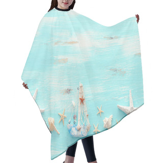 Personality  Vacation And Summer Concept With Vintage Boat, Starfish And Seashells Over Pastel Blue Wooden Background. Top View Flat Lay Hair Cutting Cape
