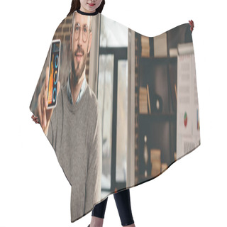 Personality  Cropped View Of Casual Businessman Holding Smartphone With Graph On Screen In Loft Office Hair Cutting Cape
