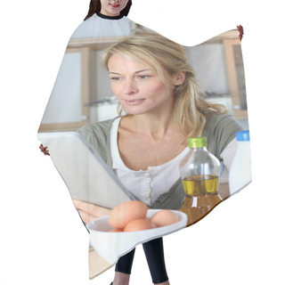 Personality  Woman In Kitchen Looking At Dessert Recipe On Internet Hair Cutting Cape