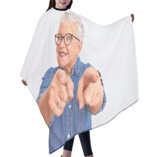 Personality  Senior Grey-haired Woman Wearing Denim Shirt And Glasses Over Isolated White Background Pointing To You And The Camera With Fingers, Smiling Positive And Cheerful Hair Cutting Cape