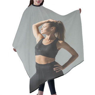 Personality  Side View Of Fit Sportswoman In Leggings And Sports Bra Looking Away And While Standing On Grey  Hair Cutting Cape