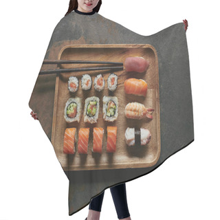 Personality  Top View Of Arranged Sushi Set On Wooden Plate And Chopsticks On Dark Surface Hair Cutting Cape