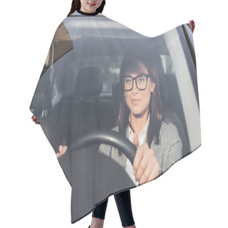 Personality  Smiling Businesswoman Looking Ahead While Driving Car On Blurred Foreground Hair Cutting Cape