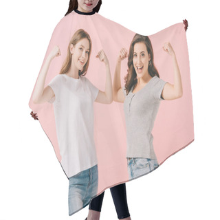Personality  Attractive And Smiling Women In T-shirts Showing Muscles And Looking At Camera Isolated On Pink Hair Cutting Cape