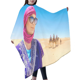 Personality  Portrait Of Beautiful Woman In Arabic Traditional Clothing Against Background Of Tourists Riding On Camels. Sahara Desert, Tunisia, North Africa        Hair Cutting Cape