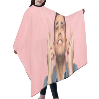 Personality  Panoramic Shot Of Smiling Man With Crossed Fingers Looking Away Isolated On Pink Hair Cutting Cape