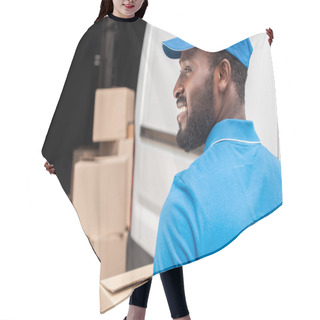 Personality  Side View Of Smiling African American Delivery Man Looking Away Hair Cutting Cape