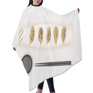 Personality  Top View Of Delicious Gyoza On Plate Near Chopsticks And Soy Sauce On White Background Hair Cutting Cape