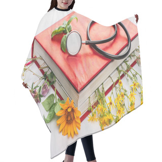 Personality  Herbs In Book With Stethoscope On White Background, Naturopathy Concept Hair Cutting Cape