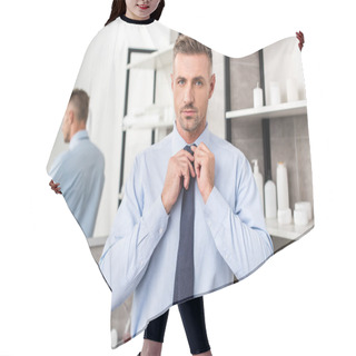 Personality  Portrait Of Handsome Businessman Tying Necktie In Bathroom  Hair Cutting Cape