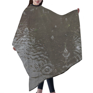 Personality  Blurred Image Of A Puddle During Rain. Hair Cutting Cape