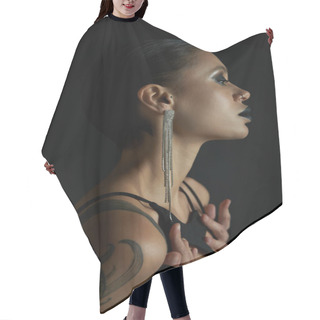 Personality  Profile Of Sensual Tattooed Woman With Dark Makeup And Shiny Earring On Black, Halloween Concept Hair Cutting Cape