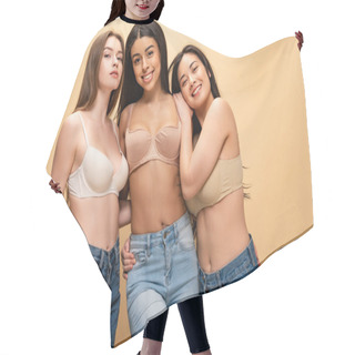 Personality  Three Multicultural Girls In Blue Jeans And Bra Embracing And Looking At Camera Isolated On Beige, Body Positivity Concept Hair Cutting Cape