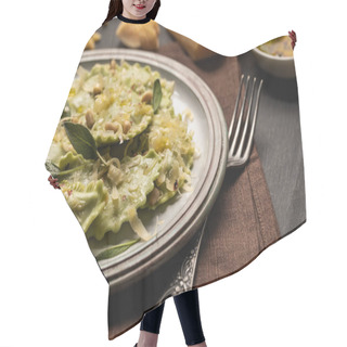 Personality  Close Up View Of Green Ravioli With Melted Cheese, Pine Nuts And Green Sage Leaves In Retro Plate On Napkin With Fork Hair Cutting Cape