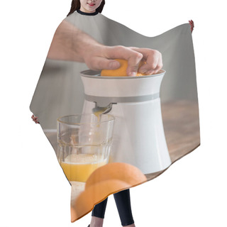 Personality  Cropped View Of Man Preparing Orange Juice In Kitchen  Hair Cutting Cape