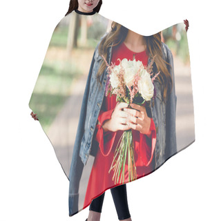 Personality  Cropped View Of Happy Woman Holding Flowers While Standing In Park  Hair Cutting Cape