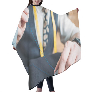 Personality  Cropped Image Of Tailor Sewing Button To Dark Blue Jacket At Sewing Workshop Hair Cutting Cape